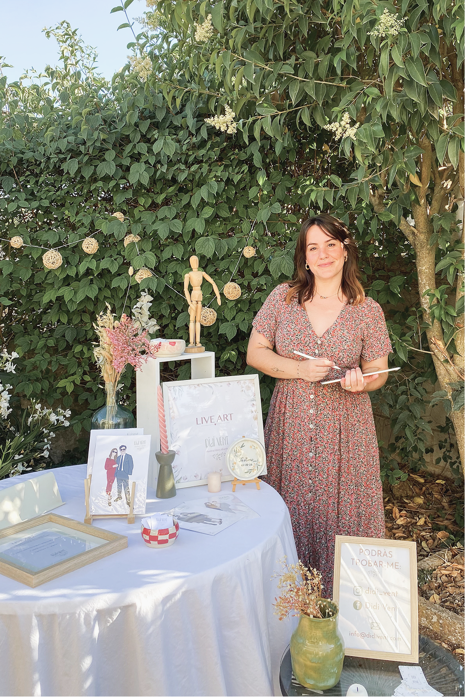 Portrait of a woman with brown hair on a flat gray background.